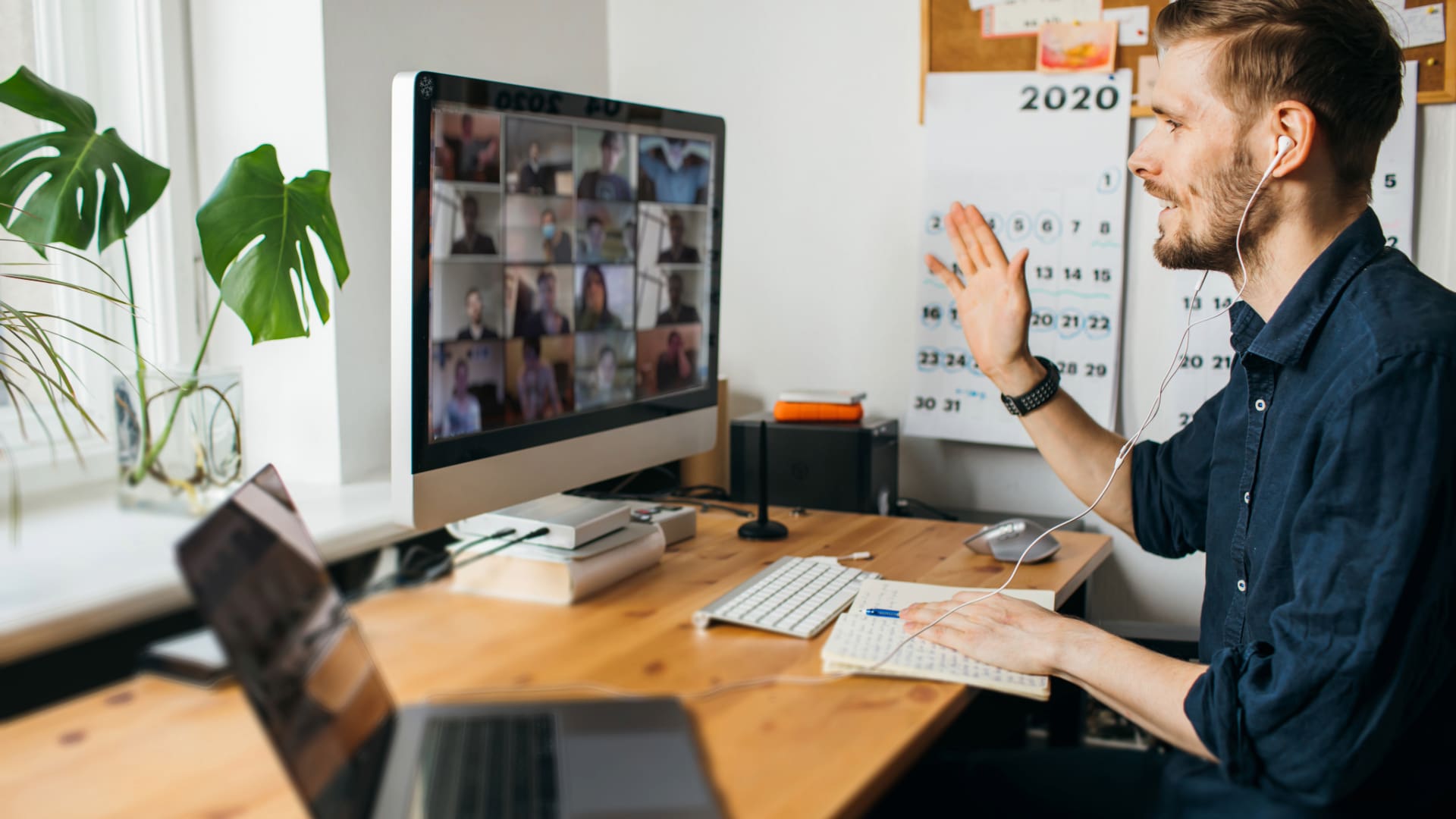Person working in a collaborative work environment remotely Person working in a collaborative work environment remotely